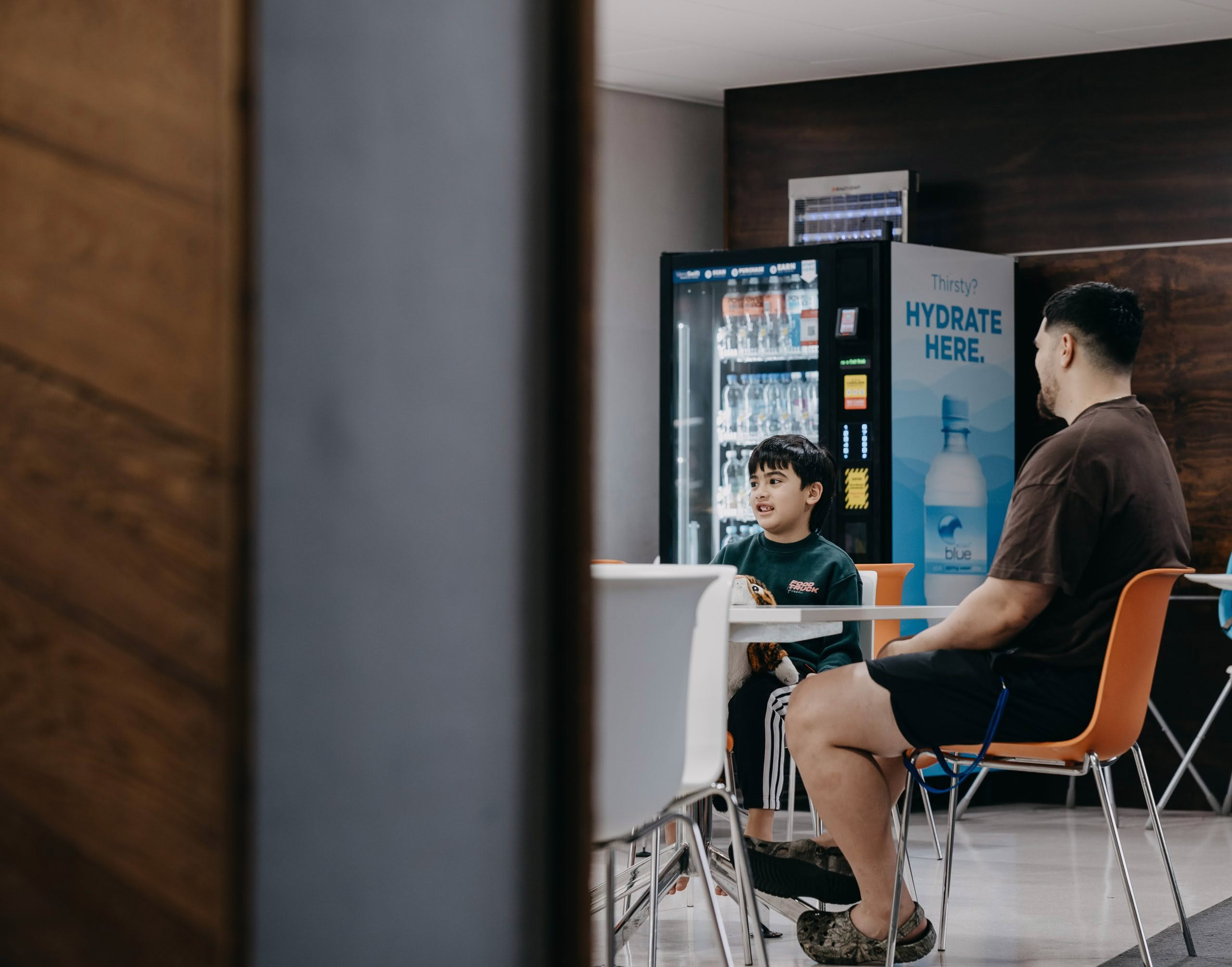 Dad and son in dining room